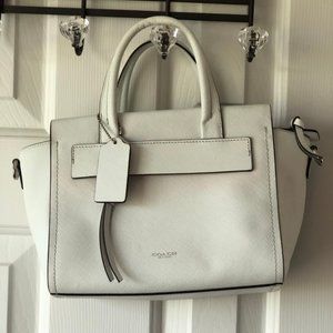 Small bag/over the shoulder. Authentic Coach